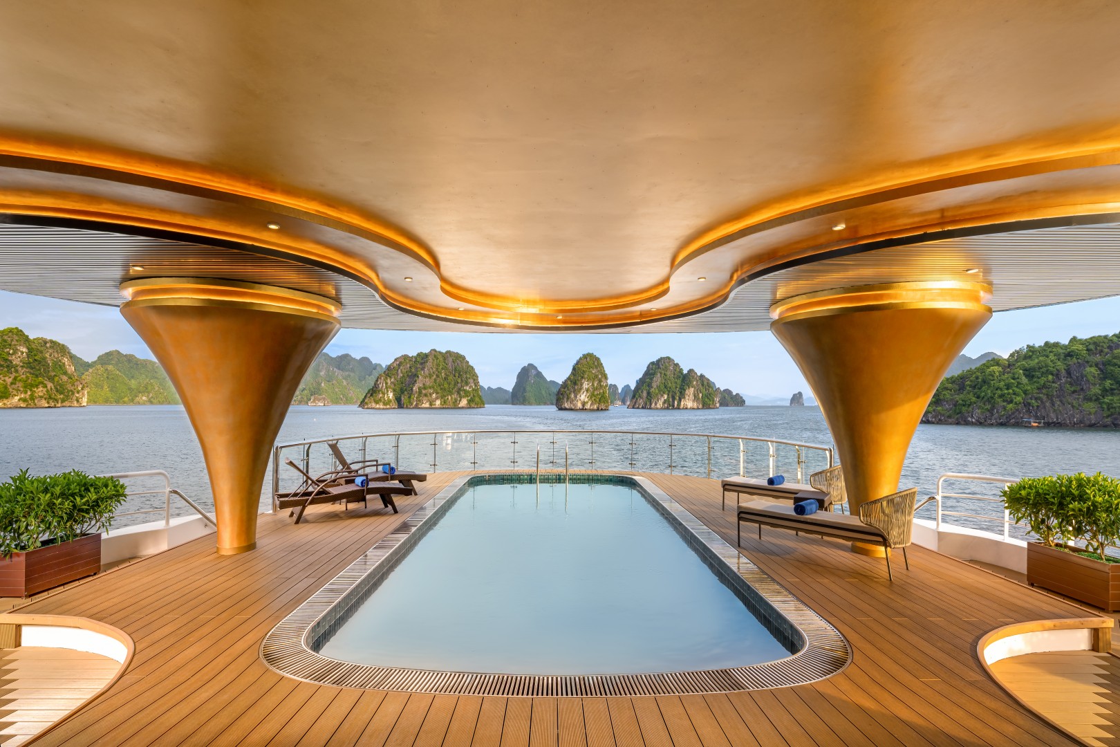 Indoor pool with bay view through glass